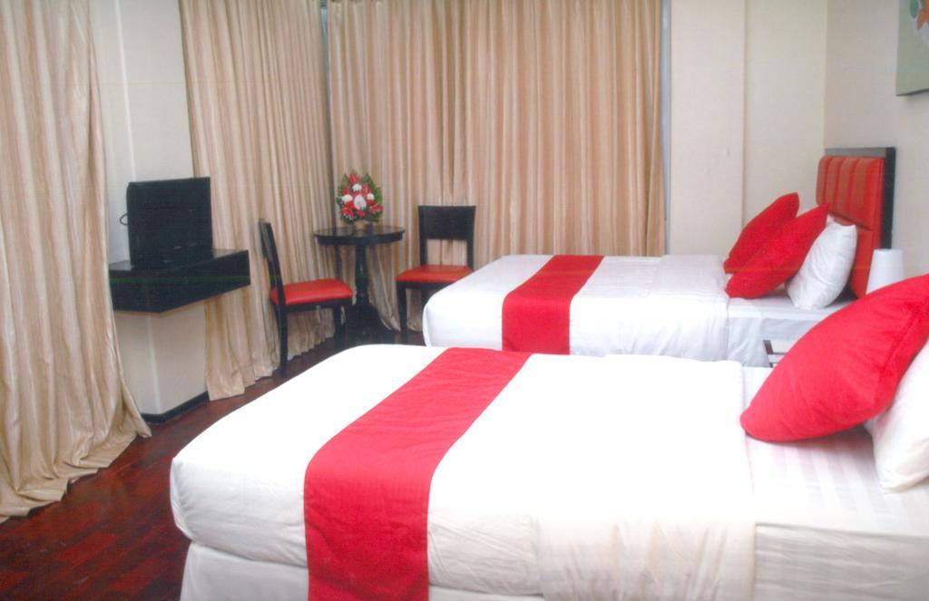 Arabelle Suites Тагбиларан Сити Екстериор снимка